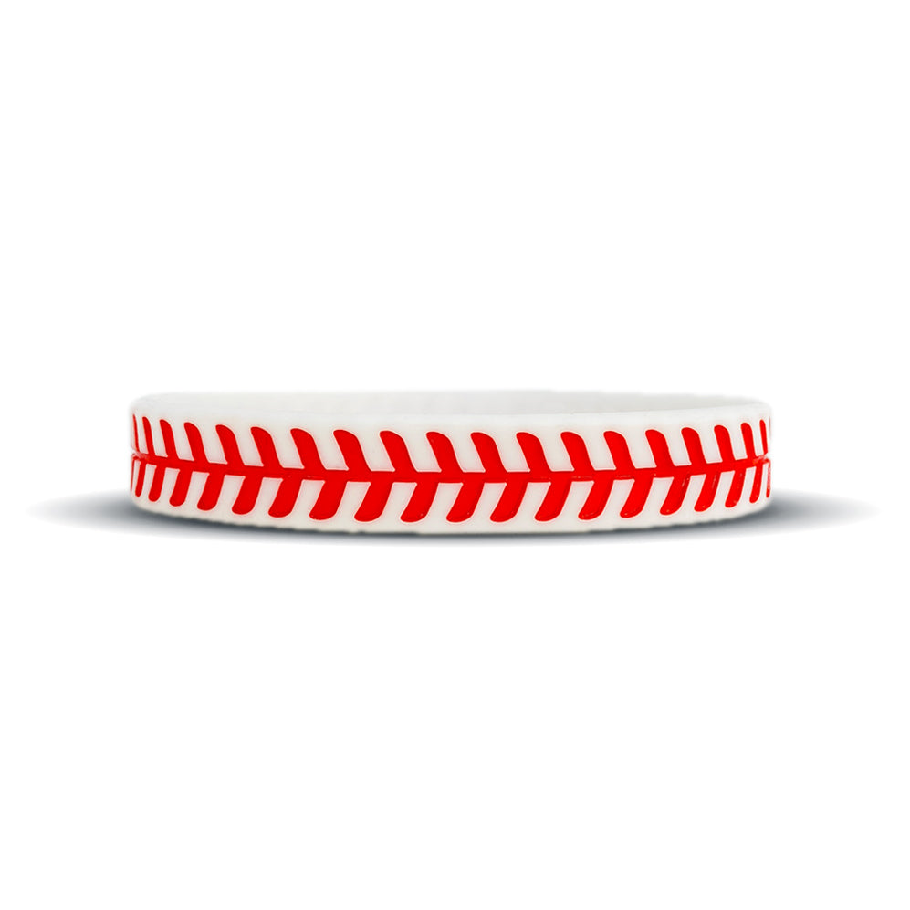 White silicone baseball wristband with red stitching debossed into the band, the message-band style of baseball wristband explained in this guide