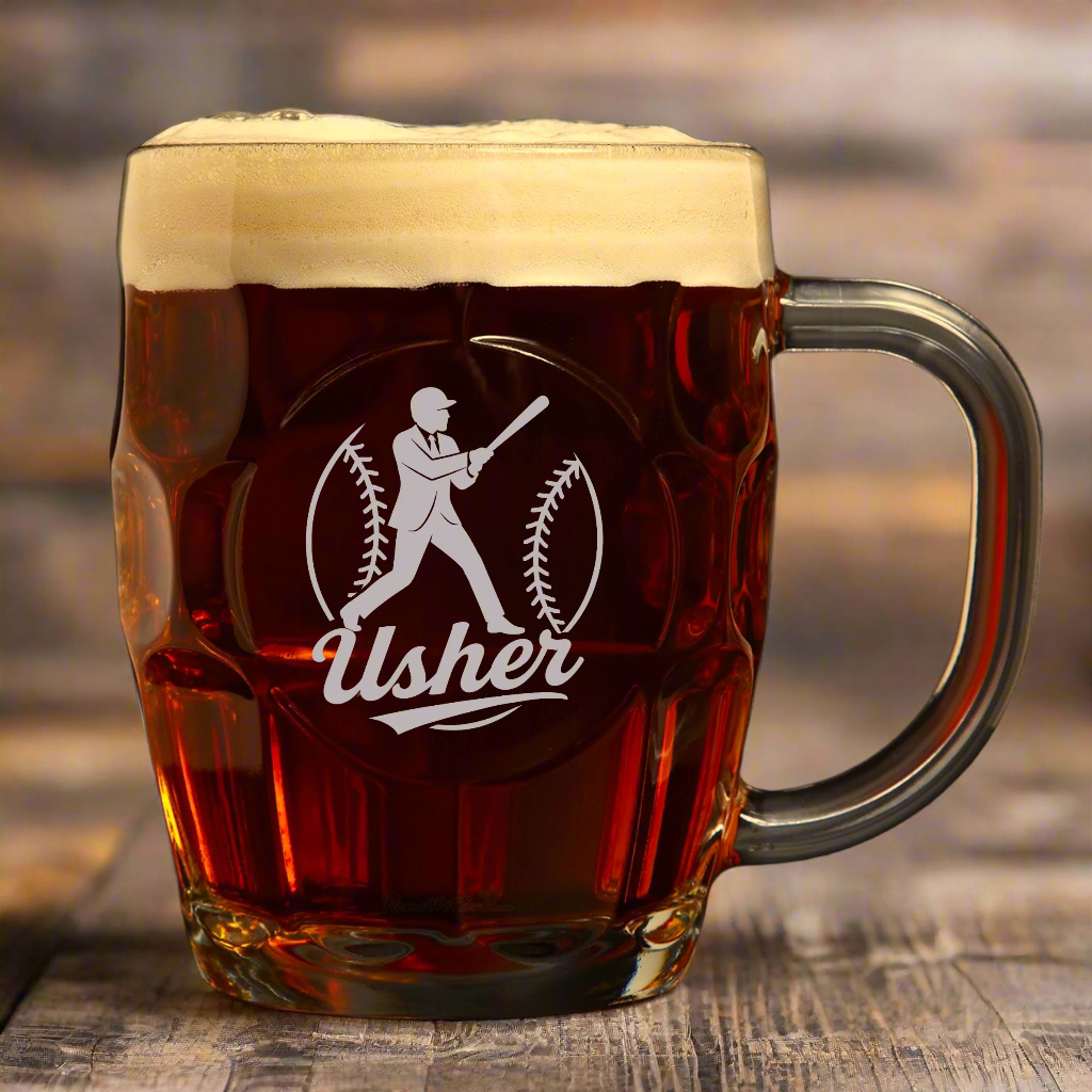 Glass mug filled with beer, featuring a 'Usher' logo on a white background