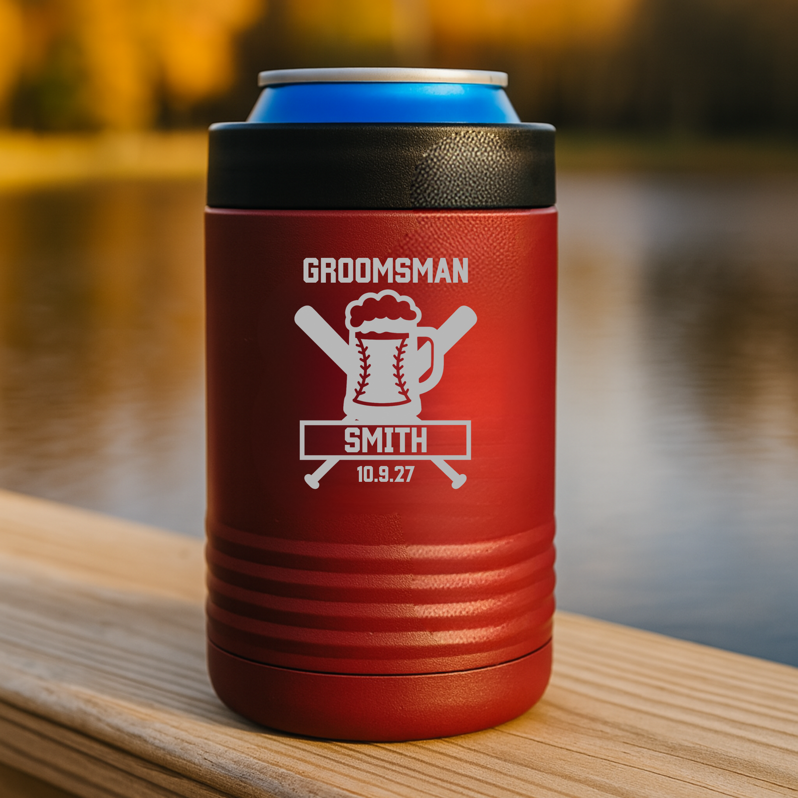 Red stainless steel can cooler with black band, laser-engraved with sample name "SMITH", baseball beer mug and bat design, and date "10.9.27
