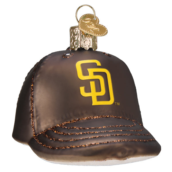 Brown and gold baseball cap ornament with San Diego Padres SD logo and bronze beaded trim detail on the bill, featuring gold-toned metal cap topper.