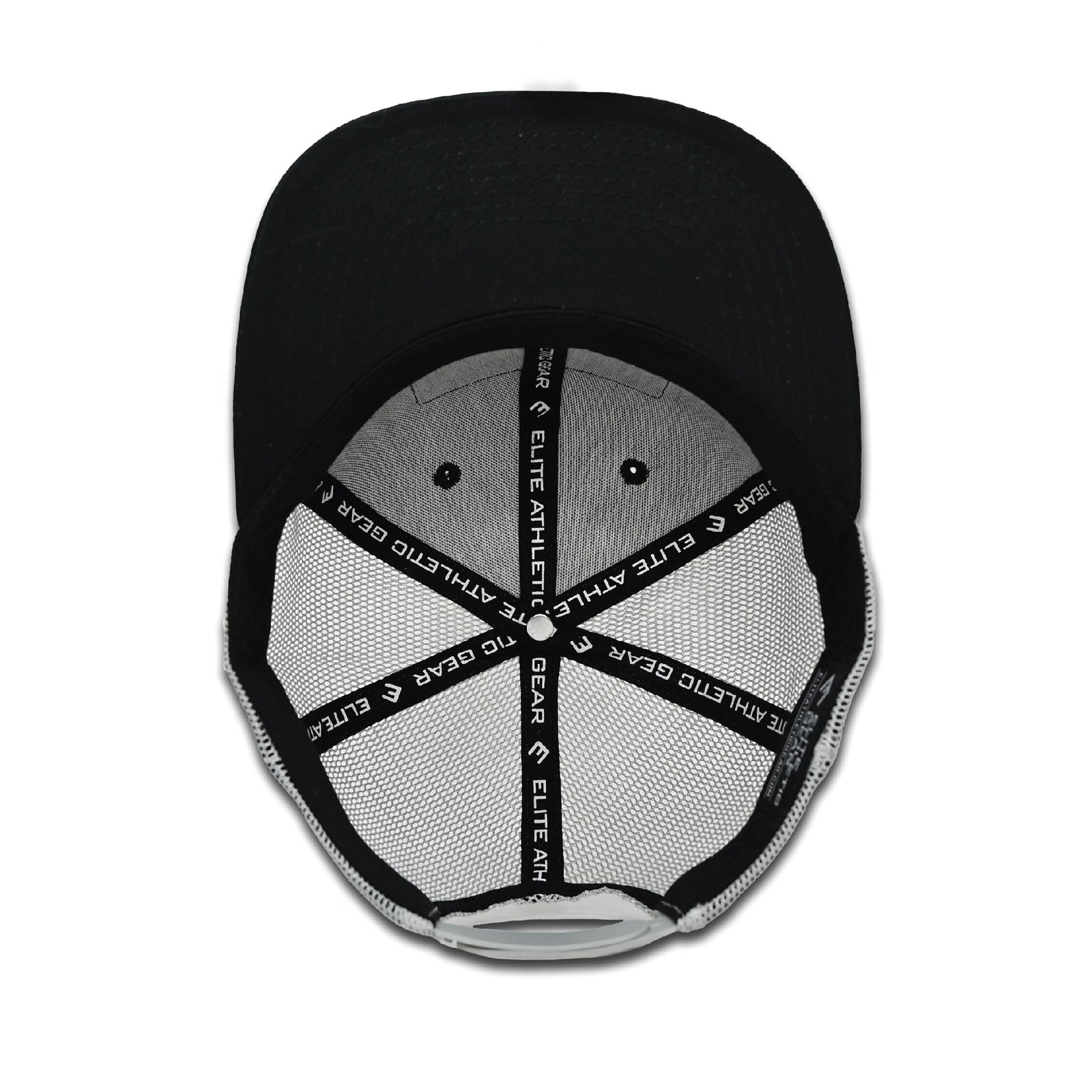 Black trucker hat with gray mesh panels and PVC patch showing Elite Athletic Gear branding and patriotic design, displayed from overhead.