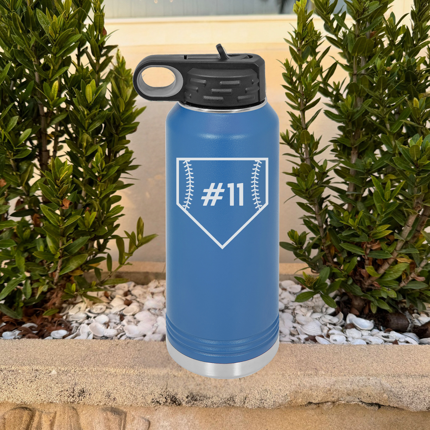 Blue stainless steel water bottle with black screw-on lid, engraved with sample number #11 in home plate design on front.