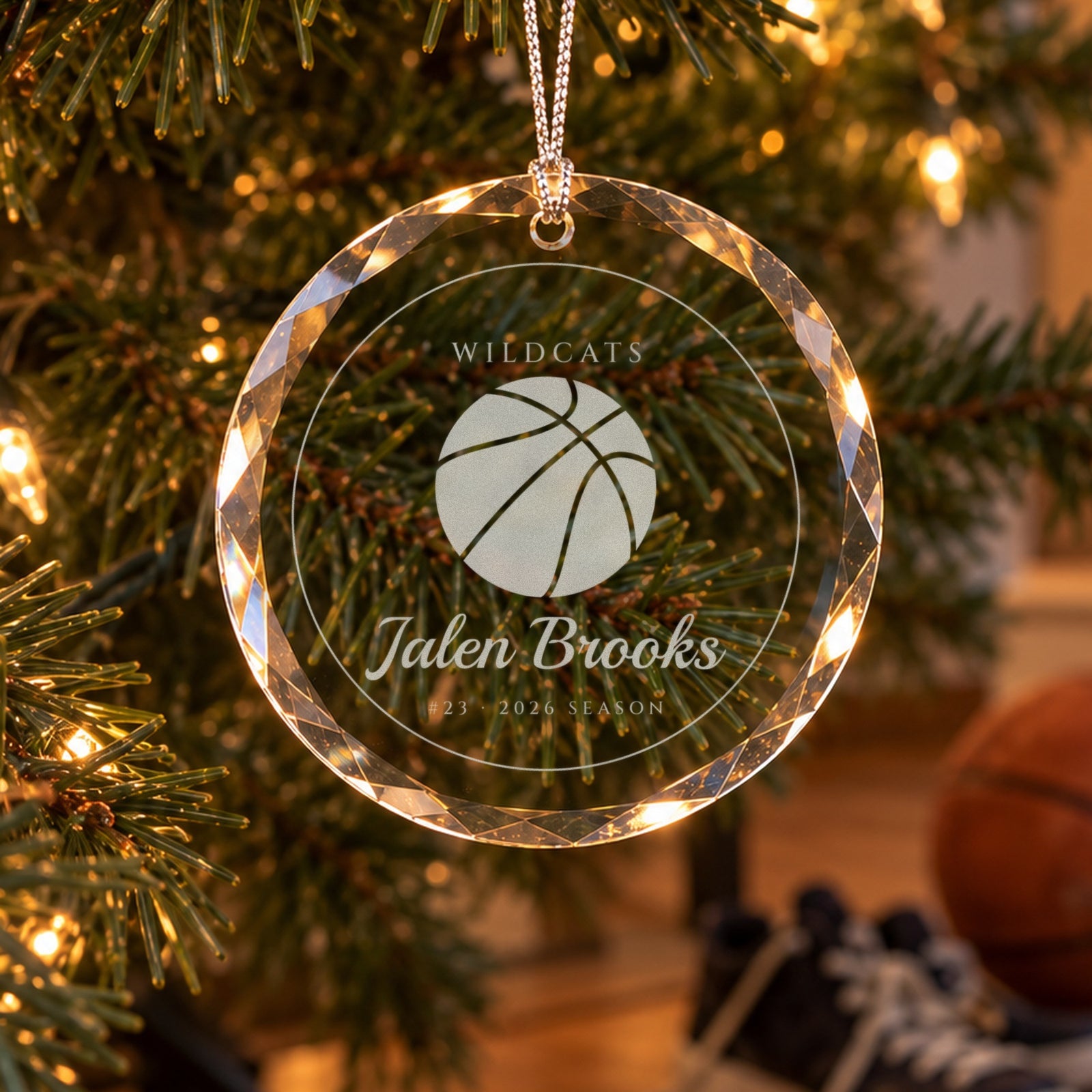 Personalized basketball ornament in faceted glass on a Christmas tree, engraved with a big basketball, WILDCATS, Jalen Brooks, #23 · 2026 SEASON