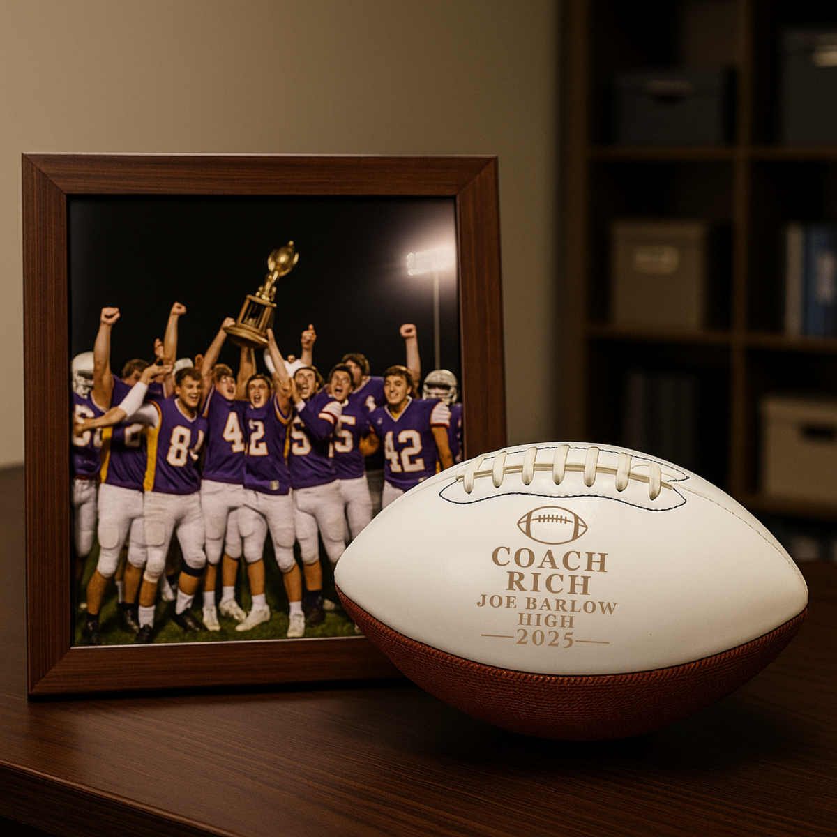 Personalized football coach keepsake ball engraved with the coach's name, school, and season, a display football that honors his leadership