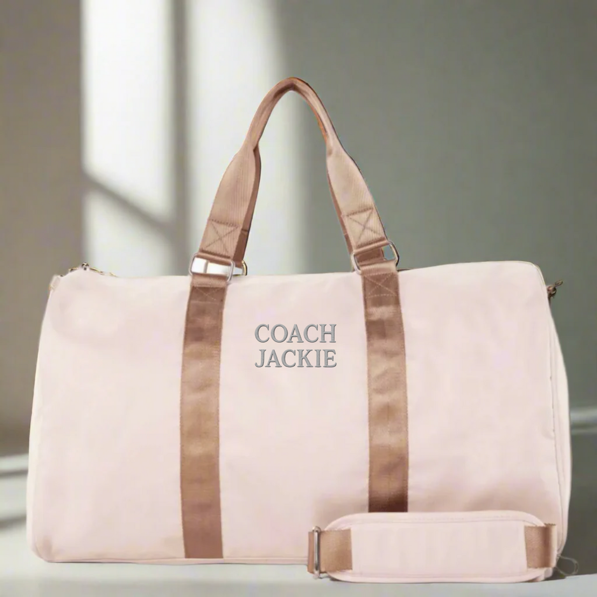Personalized soccer coach travel bag in durable polyester with a dedicated shoe compartment and detachable shoulder strap, embroidered with custom initials