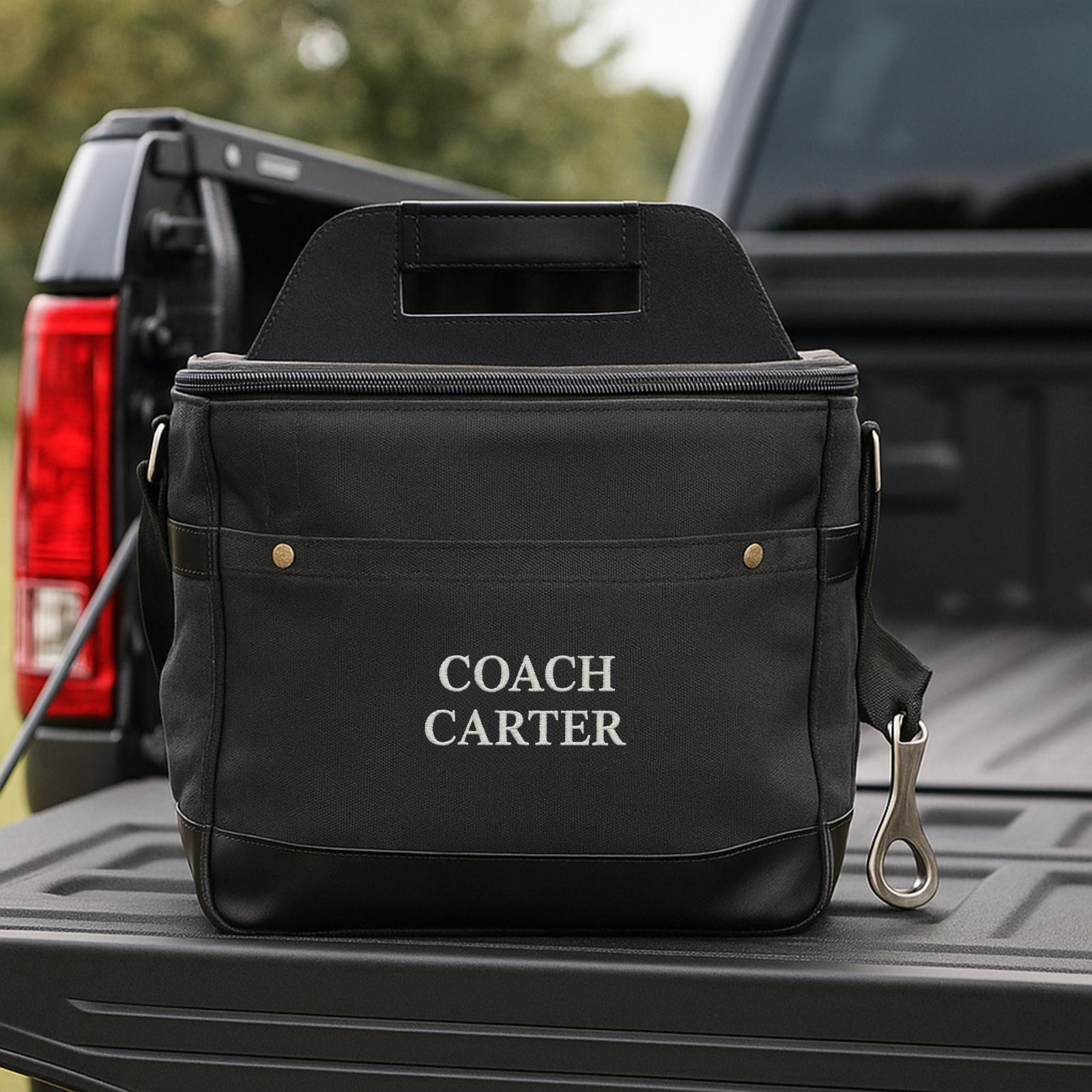 Personalized soccer coach cooler, an insulated soft-sided bag embroidered with the coach's name and a soccer design, with a built-in bottle opener