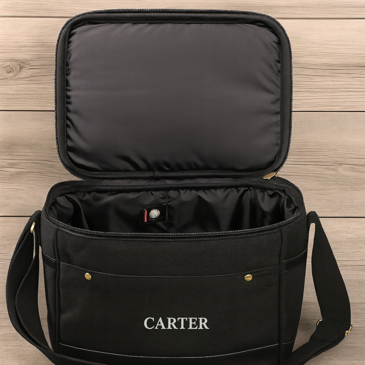 Personalized soccer coach cooler, an insulated soft-sided bag embroidered with the coach's name and a soccer design, with a built-in bottle opener