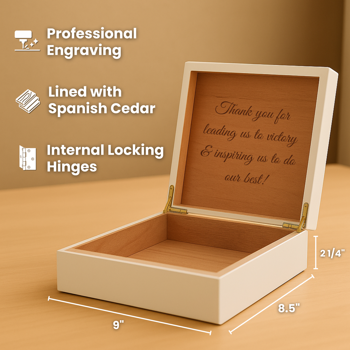 Cream wooden keepsake box with open lid displaying sample engraving "Thank you for leading us to victory & inspiring us to do our best" on cedar-lined interior, brass hinges visibl
