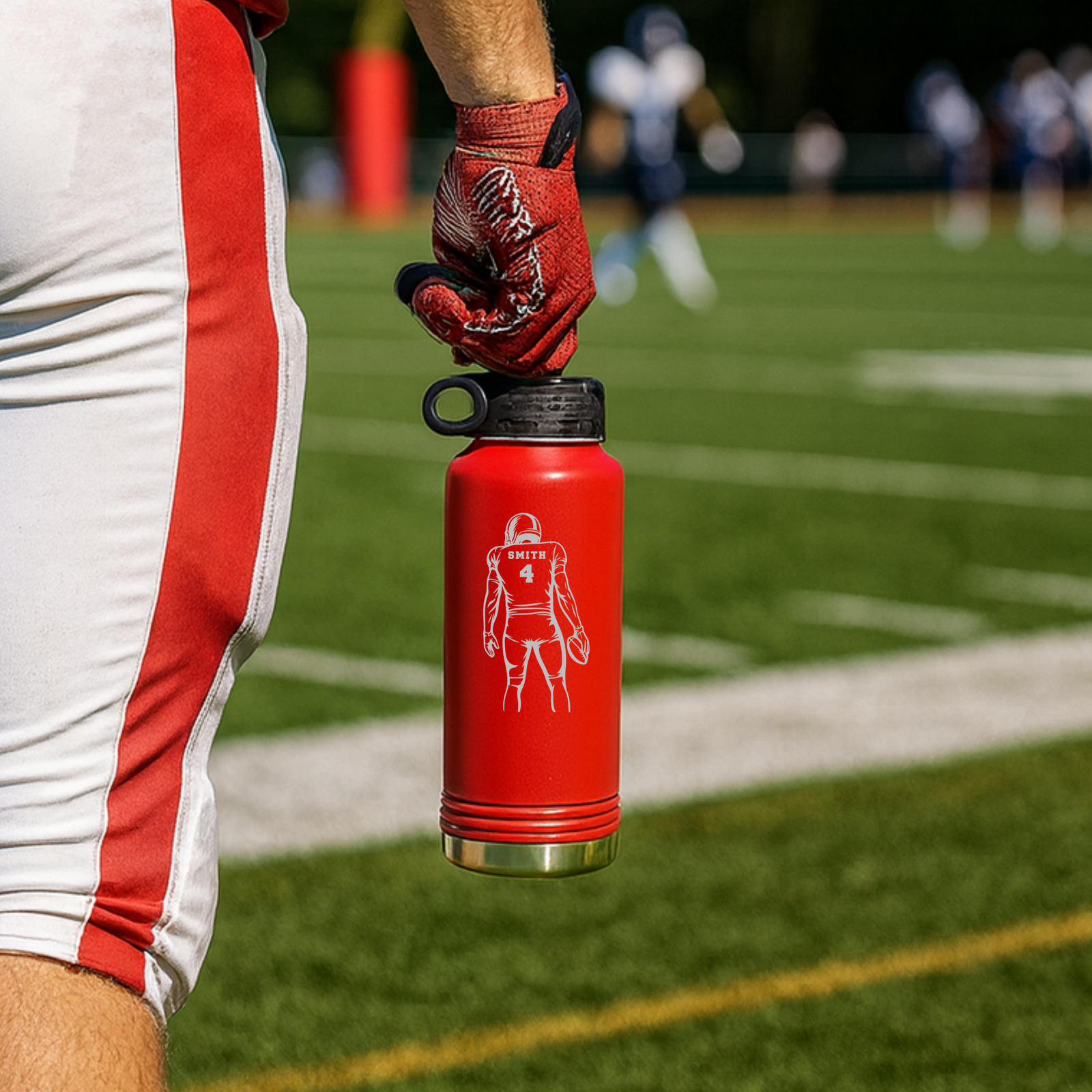 Personalized football player water bottle, a 32oz insulated stainless steel bottle engraved with his name and number in a bold football player design