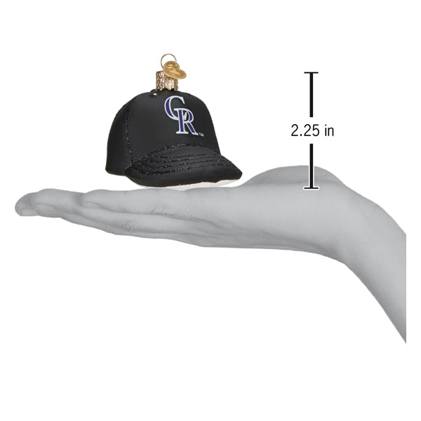 Black baseball cap ornament with CR Rockies logo displayed on open hand with 2.25 inch height measurement shown