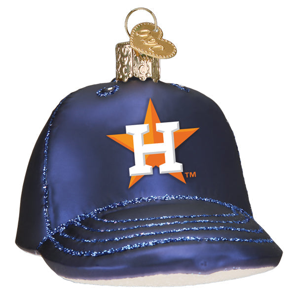 Close-up of the navy Astros cap glass ornament showing the H-and-star logo and the glittered brim and stitching detail