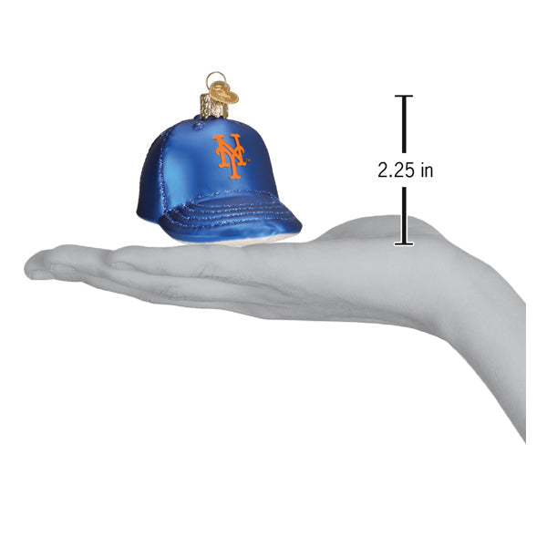 Blue baseball cap ornament with orange Mets logo, shown in hand with size reference of 2.25 inches