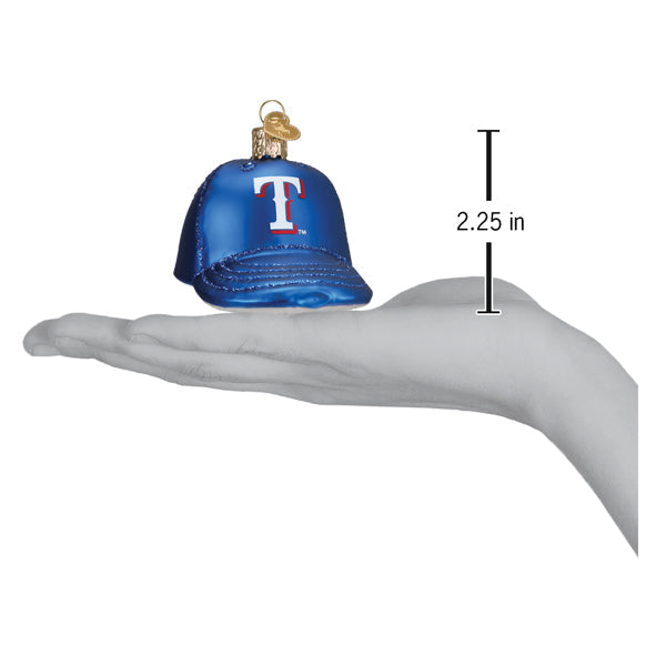 Blue Texas Rangers baseball cap ornament shown at actual size of 2.25 inches tall, displayed on an outstretched hand
