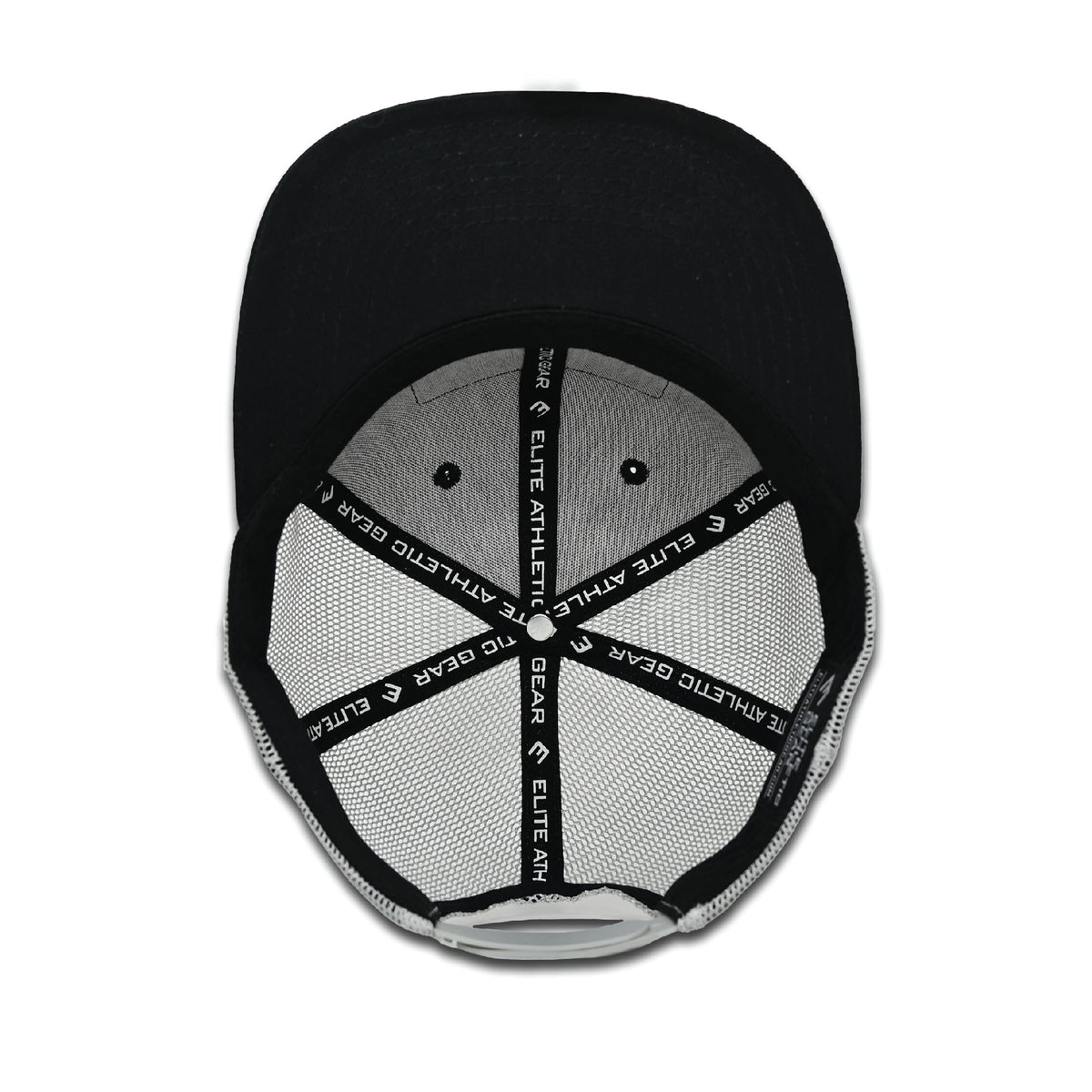 Black trucker hat with gray mesh panels and PVC patch showing Elite Athletic Gear branding and patriotic design, displayed from overhead.