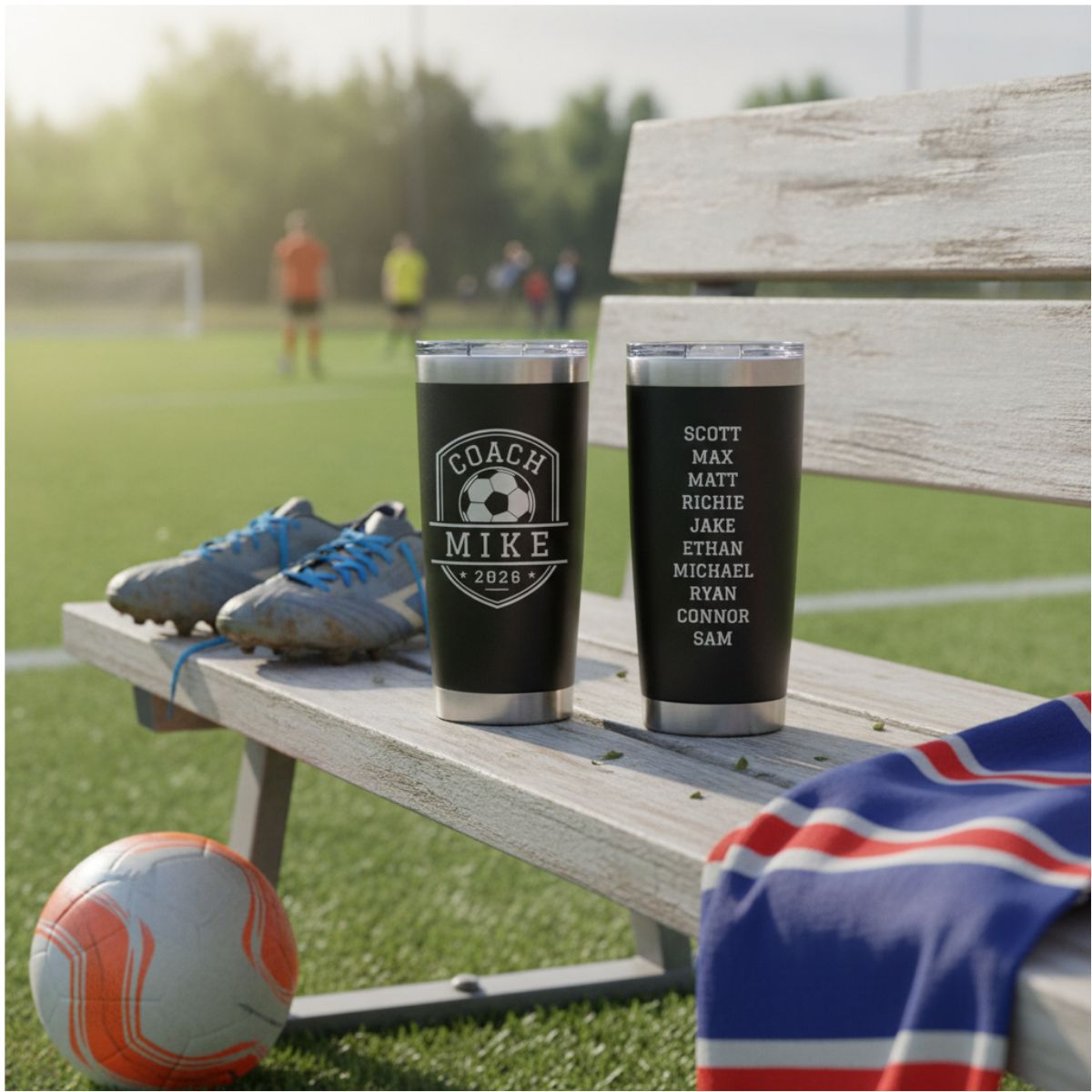 Personalized soccer coach tumbler with the coach's name and a soccer design engraved on the front and the full team roster engraved on the back