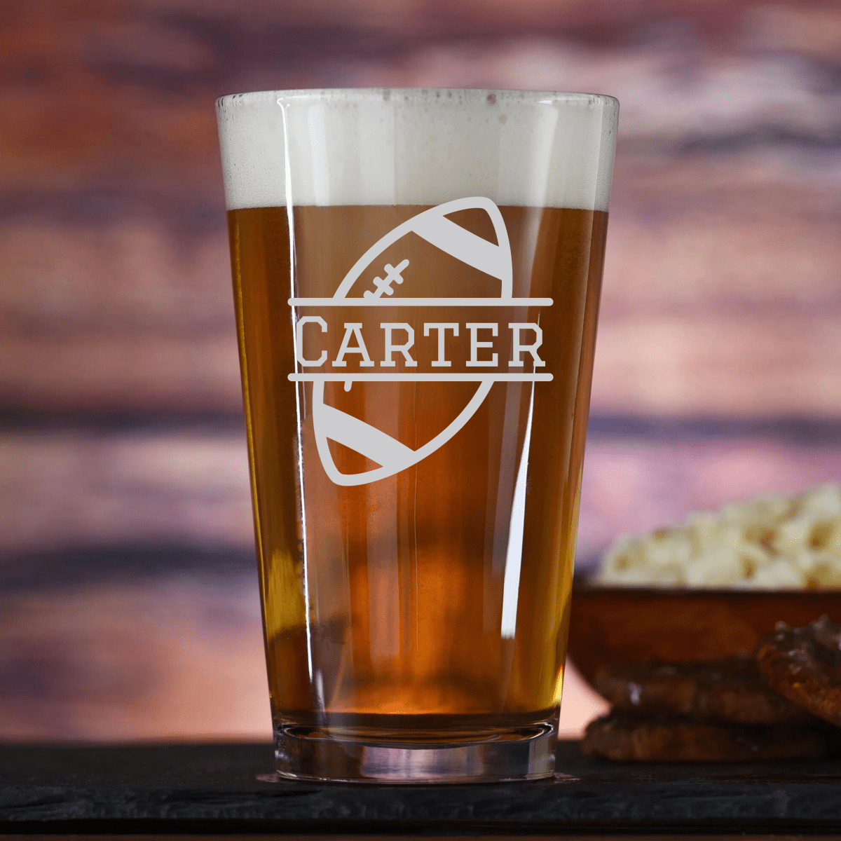 Gridiron Glory personalized pint glass laser-etched with a football design, 16 oz beer glass gift