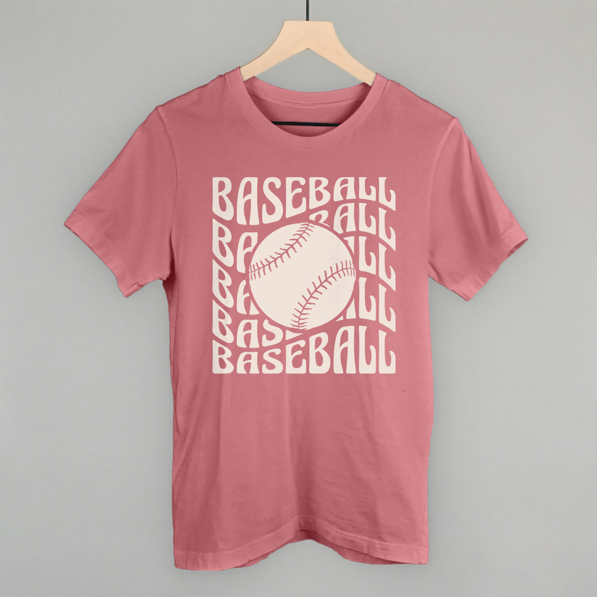 Mauve Bella+Canvas tee with the Baseball Groovy Wave design in stacked retro lettering and a baseball center, printed in cream ink