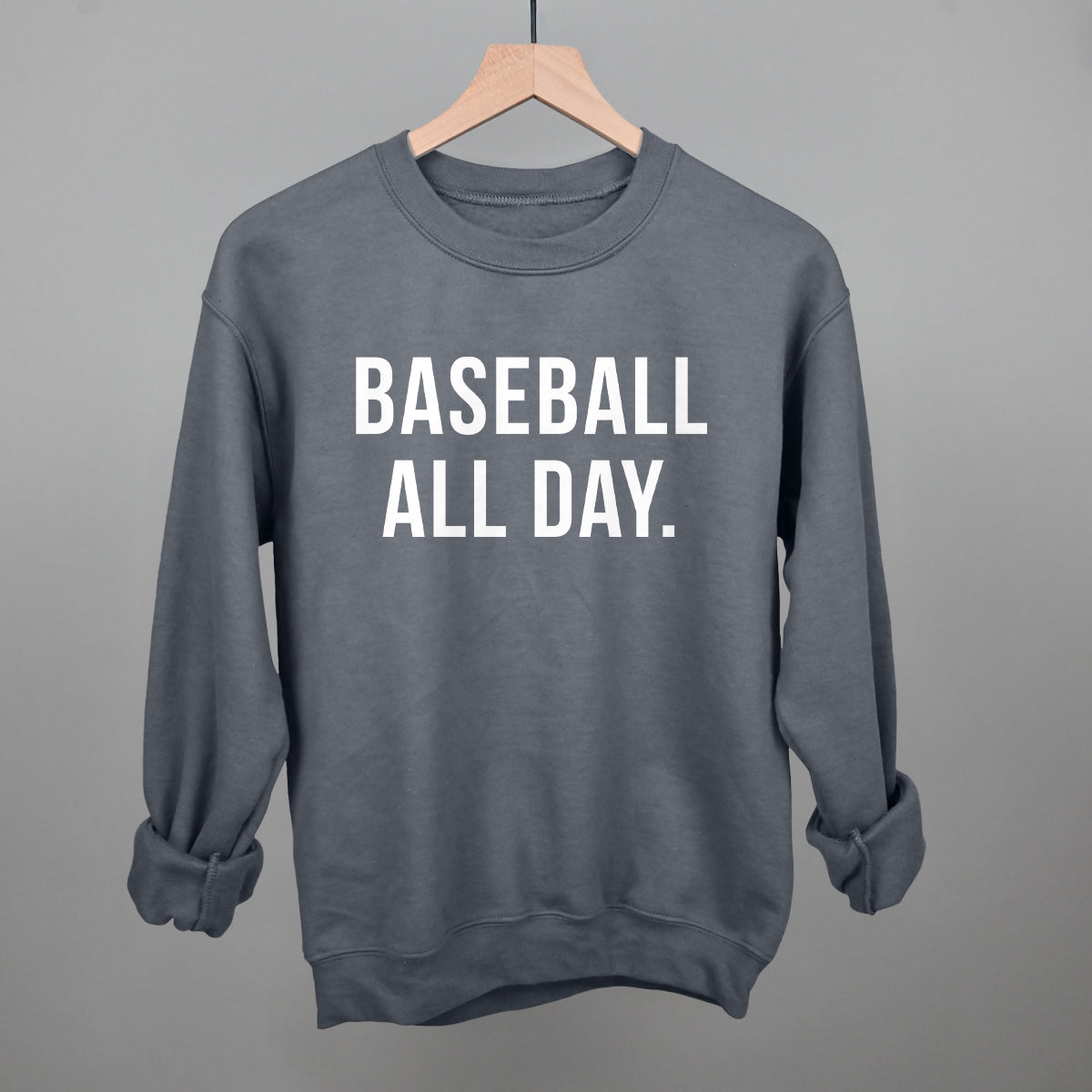 Charcoal Gildan crewneck sweatshirt with the 'Baseball All Day.' design in bold white sans-serif lettering