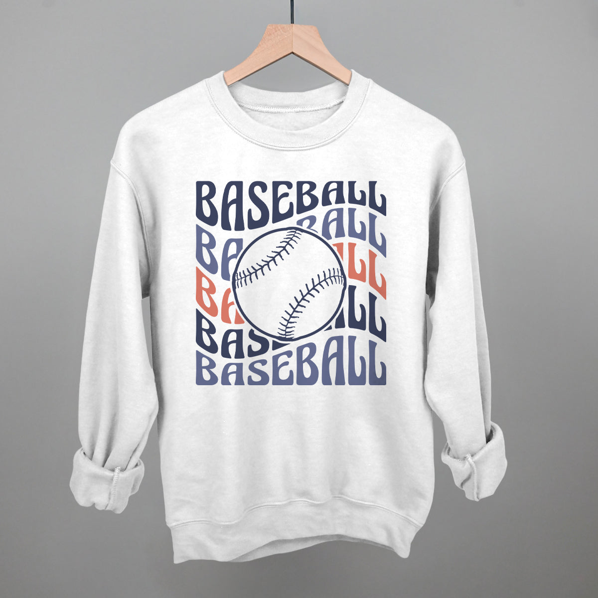 White unisex crewneck sweatshirt with the Baseball Groovy Wave design in stacked retro lettering and a baseball center, printed in multi-color navy, lavender, and orange ink
