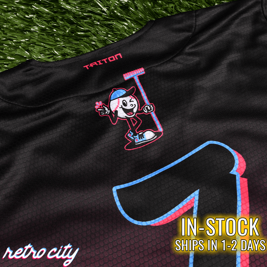 Black baseball jersey with embroidered cartoon character holding a rake, pink and blue trim, "TRITON" text at neckline, and "retrocity" script at lower left