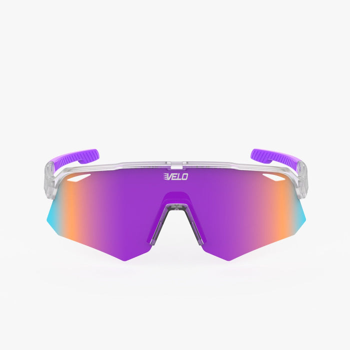 Velo Game Changers sunglasses with clear frame, purple mirrored lenses with gradient orange-to-blue coating, and purple temple arms against white background.