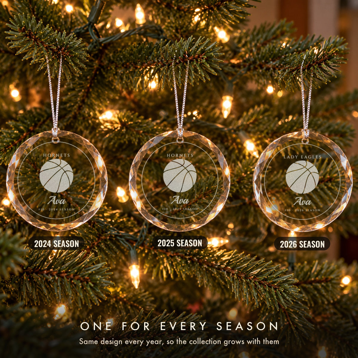 Three personalized basketball Christmas ornaments on a tree, one for each season, engraved Ava #10 for the 2024, 2025 and 2026 seasons