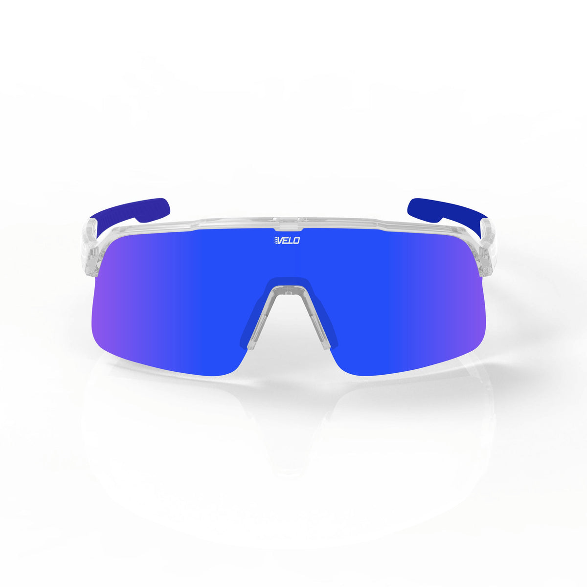 VELO Slider sunglasses with clear frame, blue mirrored lenses, and blue padded temple arms displayed straight-on against white background.