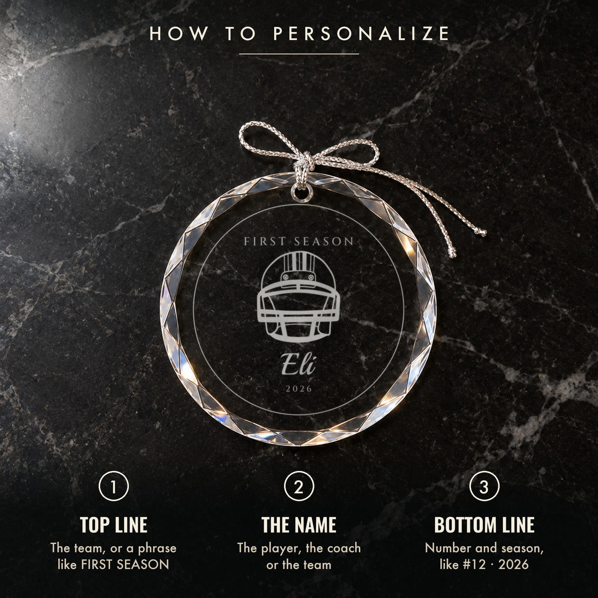 How to personalize the football ornament: 1 top line, 2 the name, 3 number and season, shown on black marble engraved FIRST SEASON, Eli, 2026