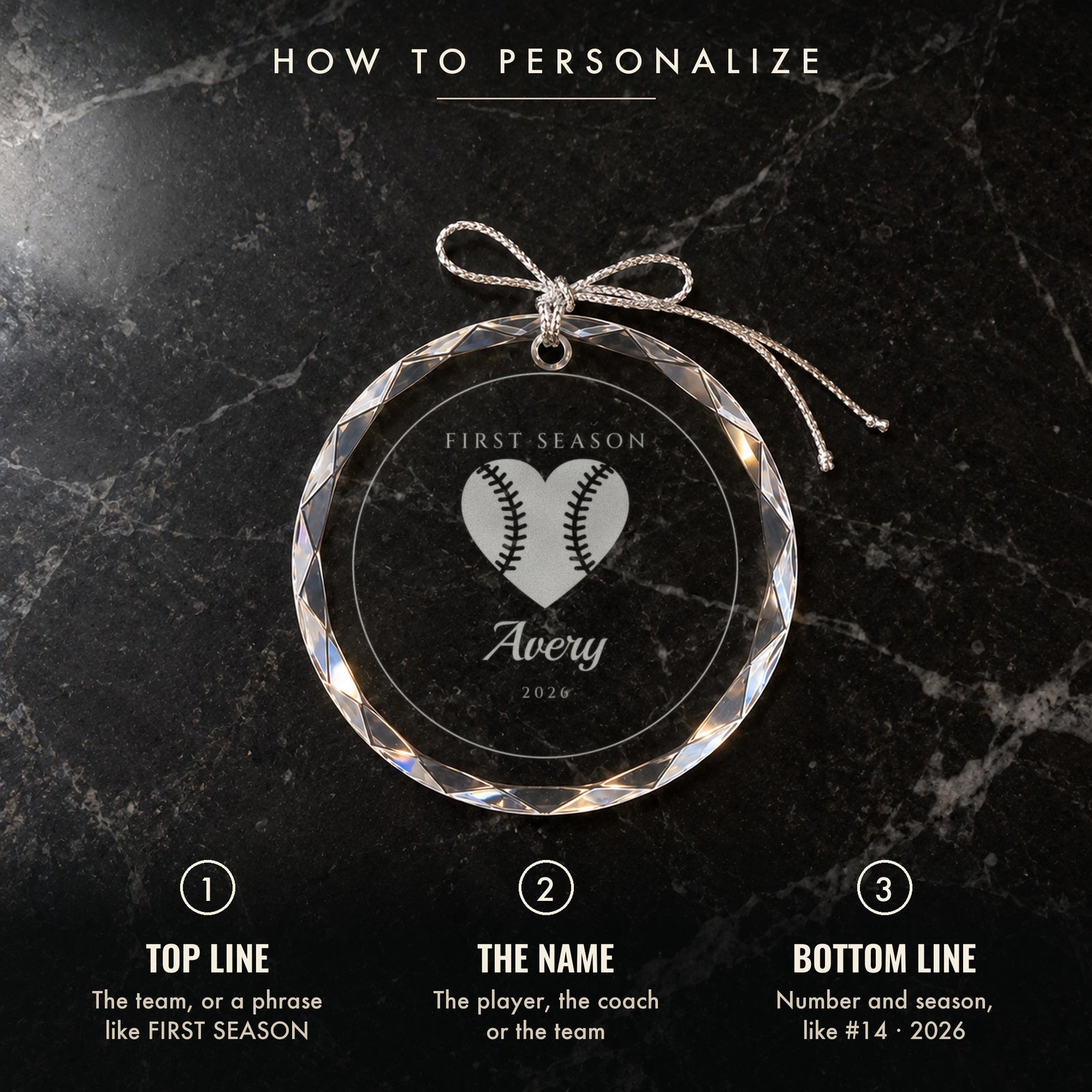 How to personalize the softball ornament: 1 top line, 2 the name, 3 number and season, shown on black marble engraved FIRST SEASON, Avery, 2026