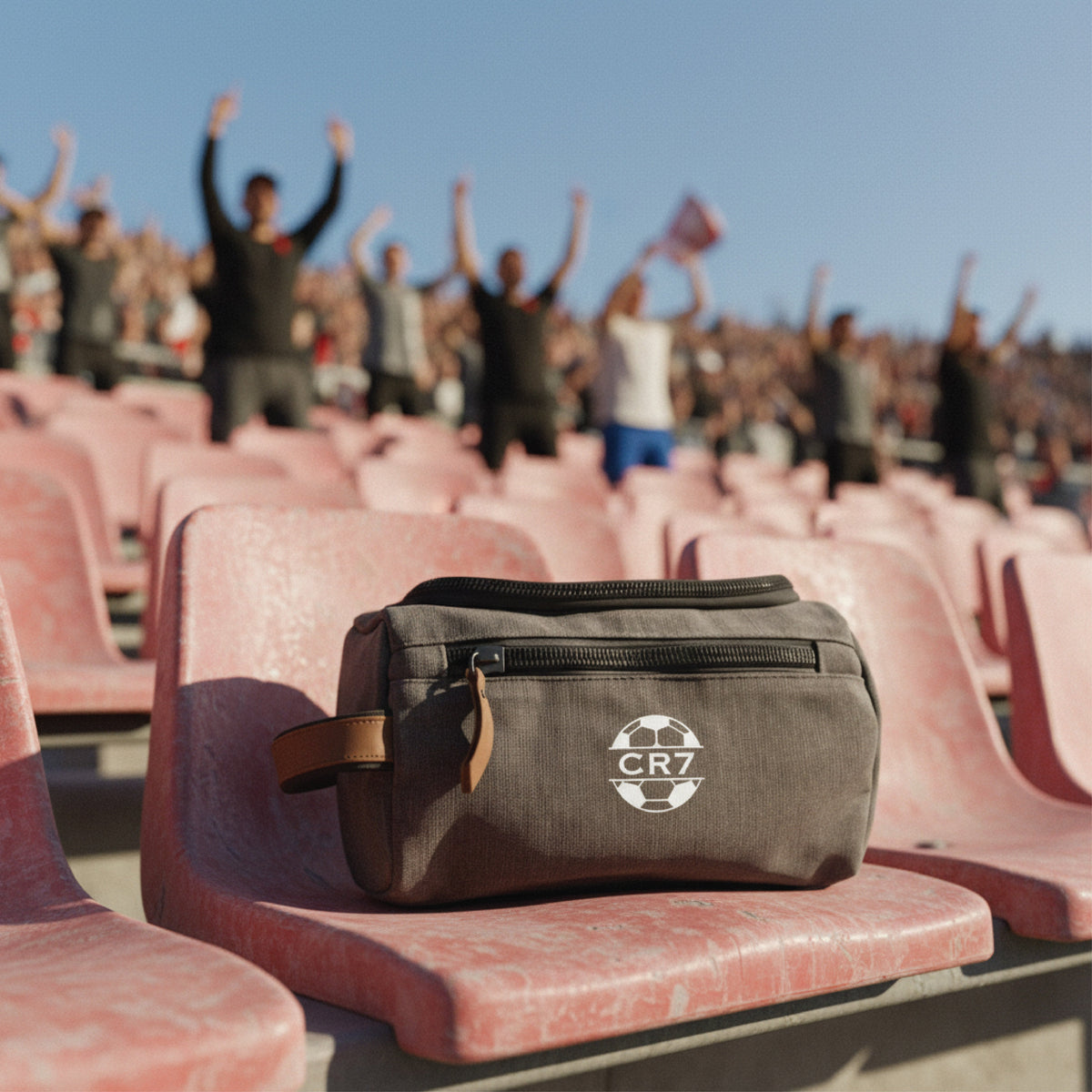 Personalized soccer toiletry bag in washed canvas with a leather handle and an embroidered soccer ball with custom initials, built for road games and college
