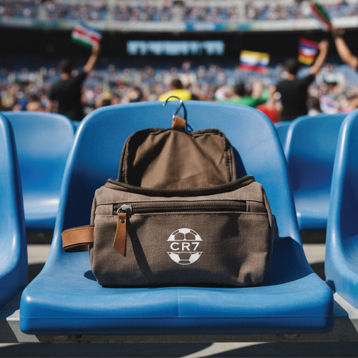 Personalized soccer toiletry bag in washed canvas with a leather handle and an embroidered soccer ball with custom initials, built for road games and college
