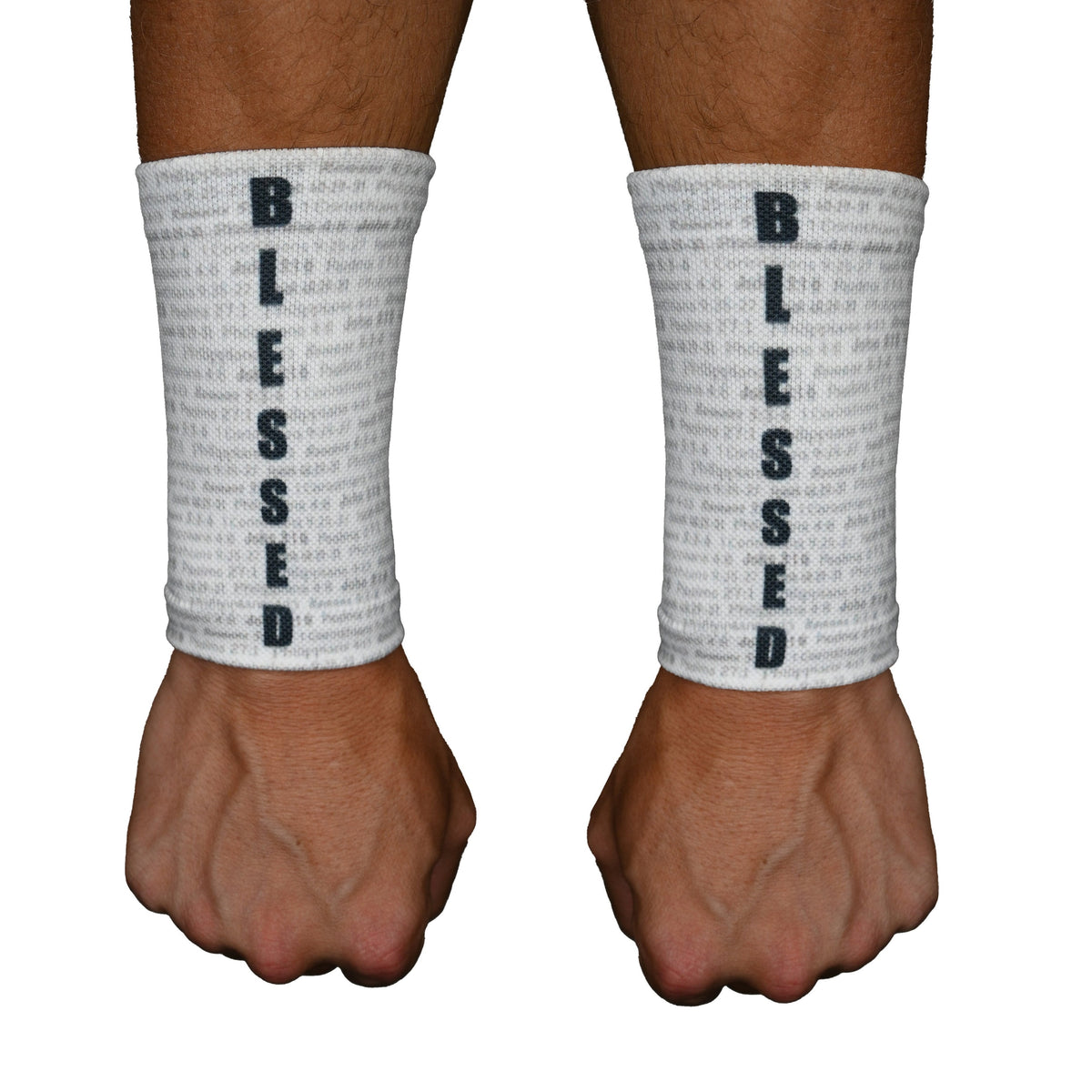 Pair of white wrist support sleeves worn on forearms, each printed with "BLESSED" in black letters running vertically down the sleeve