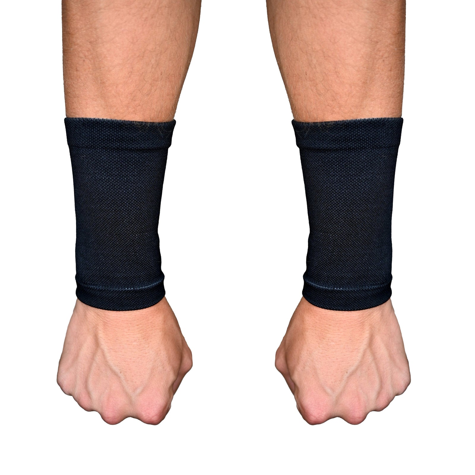 Pair of black wrist support sleeves worn on both wrists, showing seamless knit construction and compression fit around the wrist and lower forearm area.
