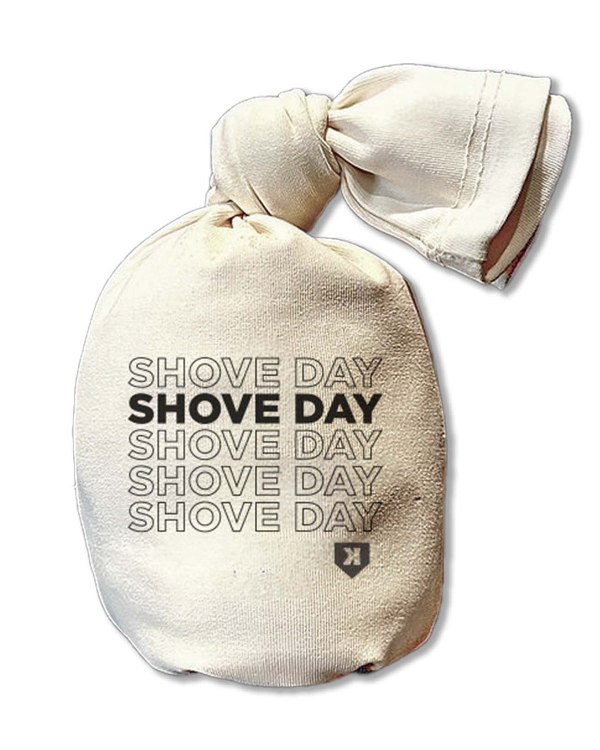 Cream-colored rosin bag printed with repeating "SHOVE DAY" text in outlined and solid lettering, displayed flat with drawstring closure visible at top.