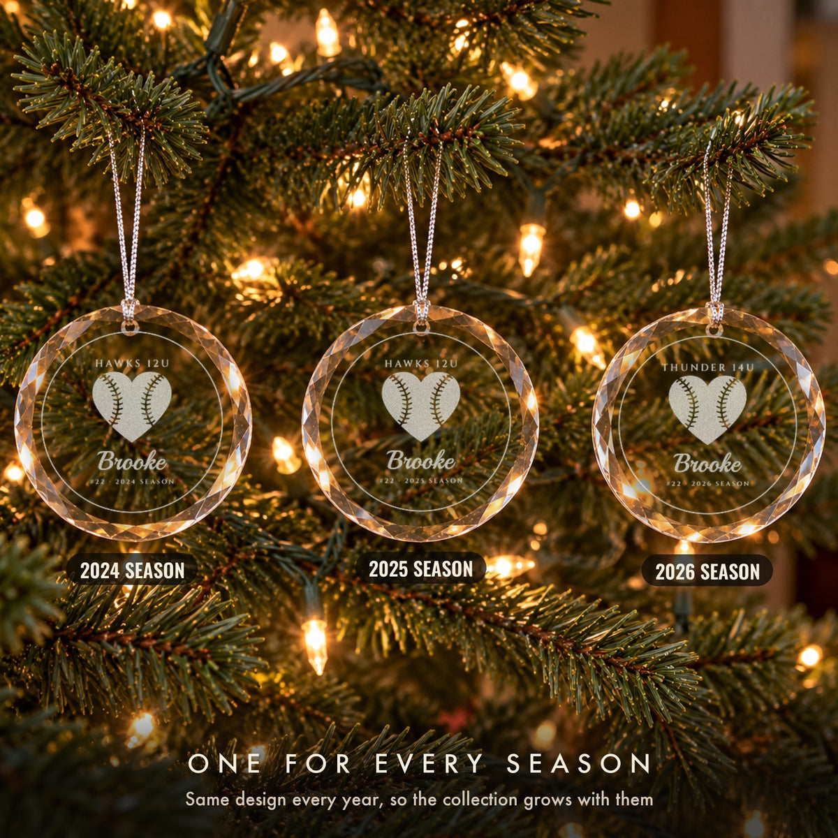 Three personalized softball Christmas ornaments on a tree, one for each season, engraved for Brooke #22 on HAWKS 12U in 2024 and 2025 and THUNDER 14U in 2026