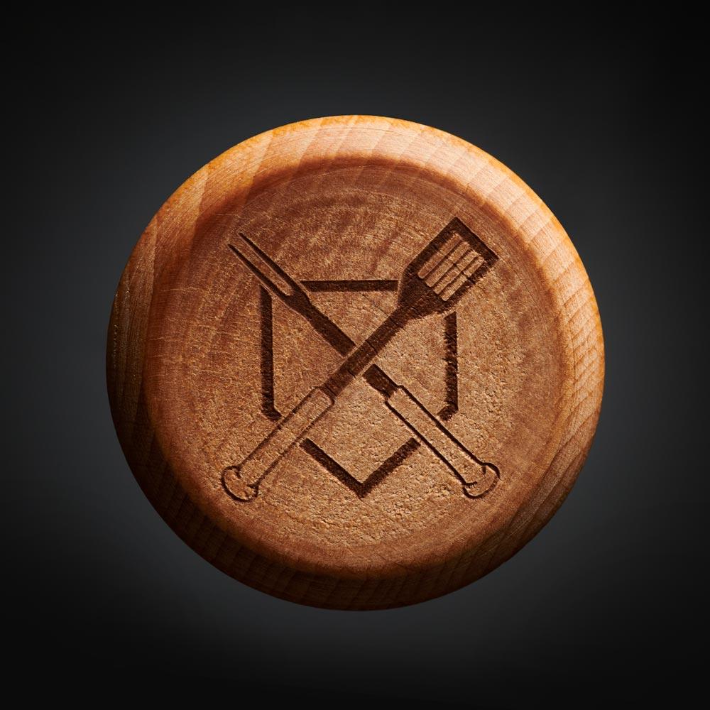 The Hook pigtail meat tool shown twice with 'YOUR TEXT HERE' and 'YOUR CUSTOM TEXT' sample personalization placeholders engraved on the bat handle